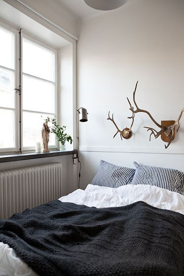 森系北欧风格卧室 鹿角背景墙装饰设计